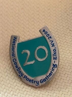 National Cowboy Poetry Gathering 20th Anniversary Teal Enamel Lapel Pin